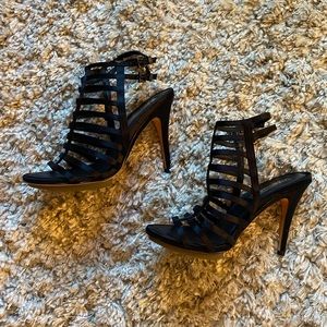 BCBG MaxAzaria heels in black.